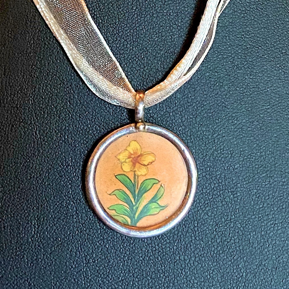 Boutique | Sterling Silver Still Life Flower Pendant on Fabric Necklace.